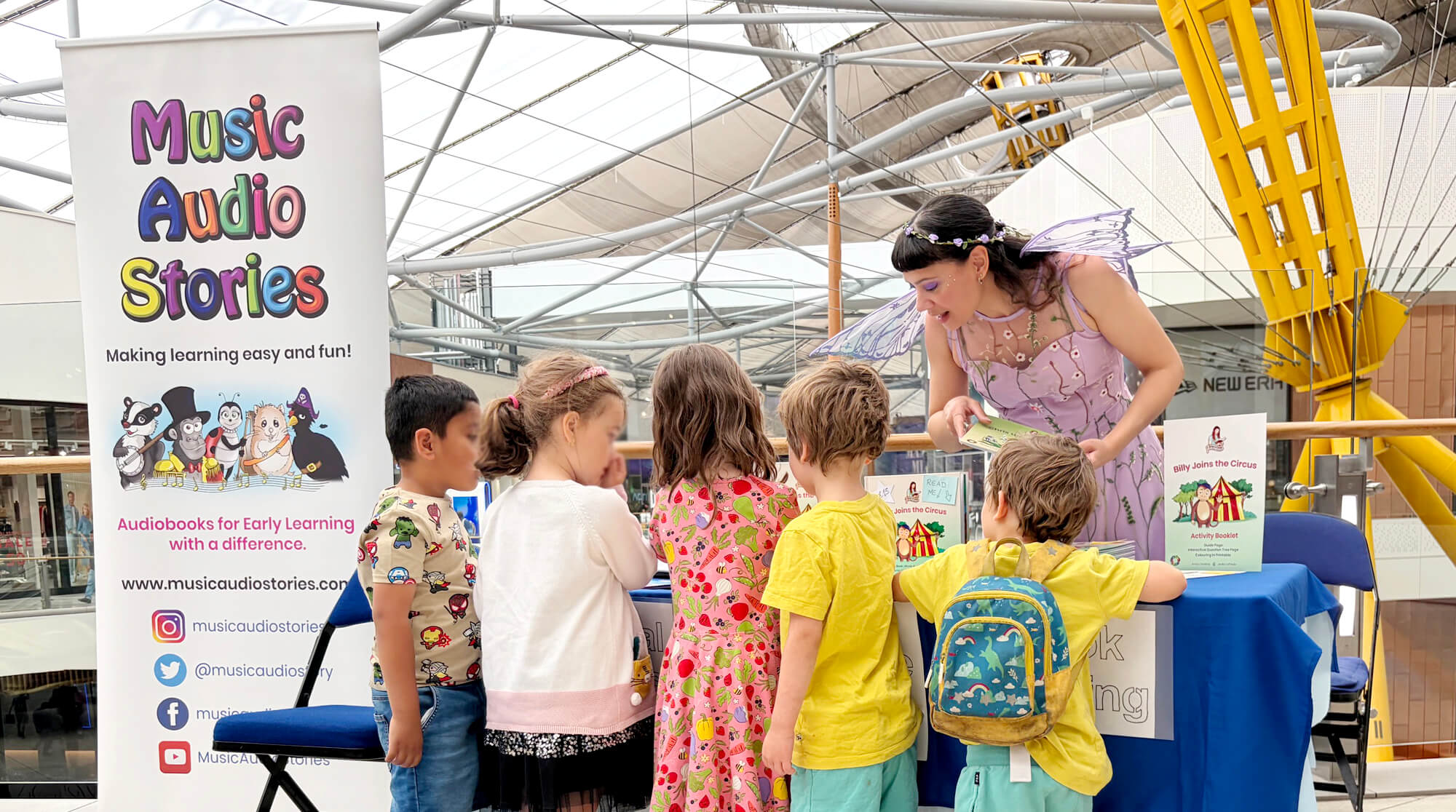 Children's author, Anna Christina, with children at The O2 London image