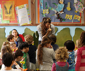 Anna Christina from Music Audio Stories doing Storytime with the children at Swiss Cottage Library image